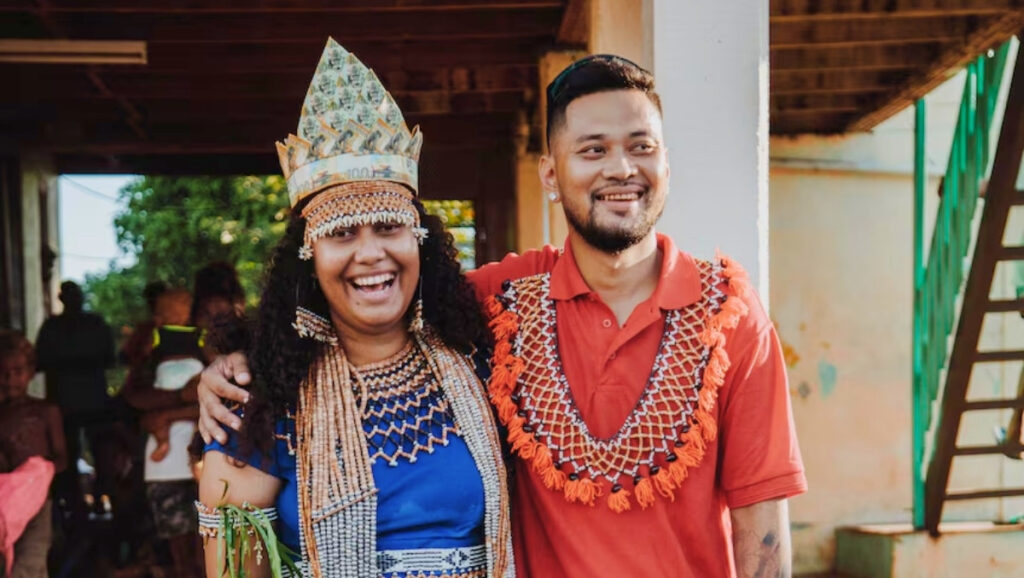 Solomon Islands couple dressed in traditional attire during a cultural marriage ceremony.