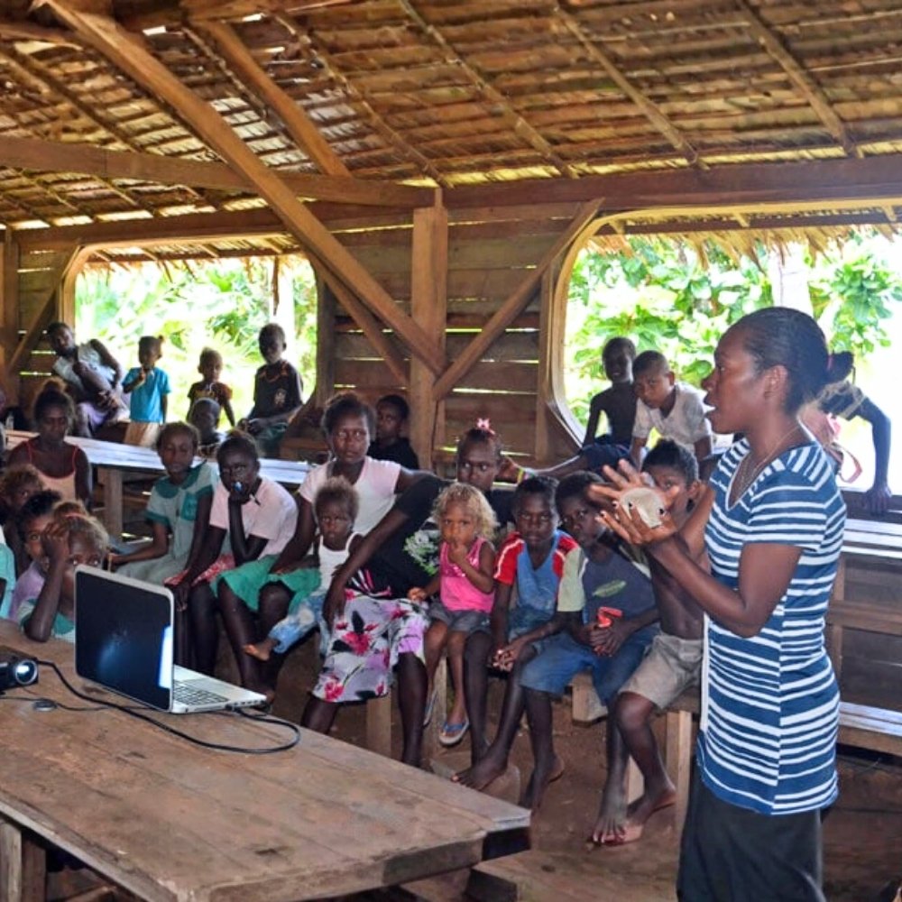 Community classroom in Solomon Islands where children learn with limited resources.