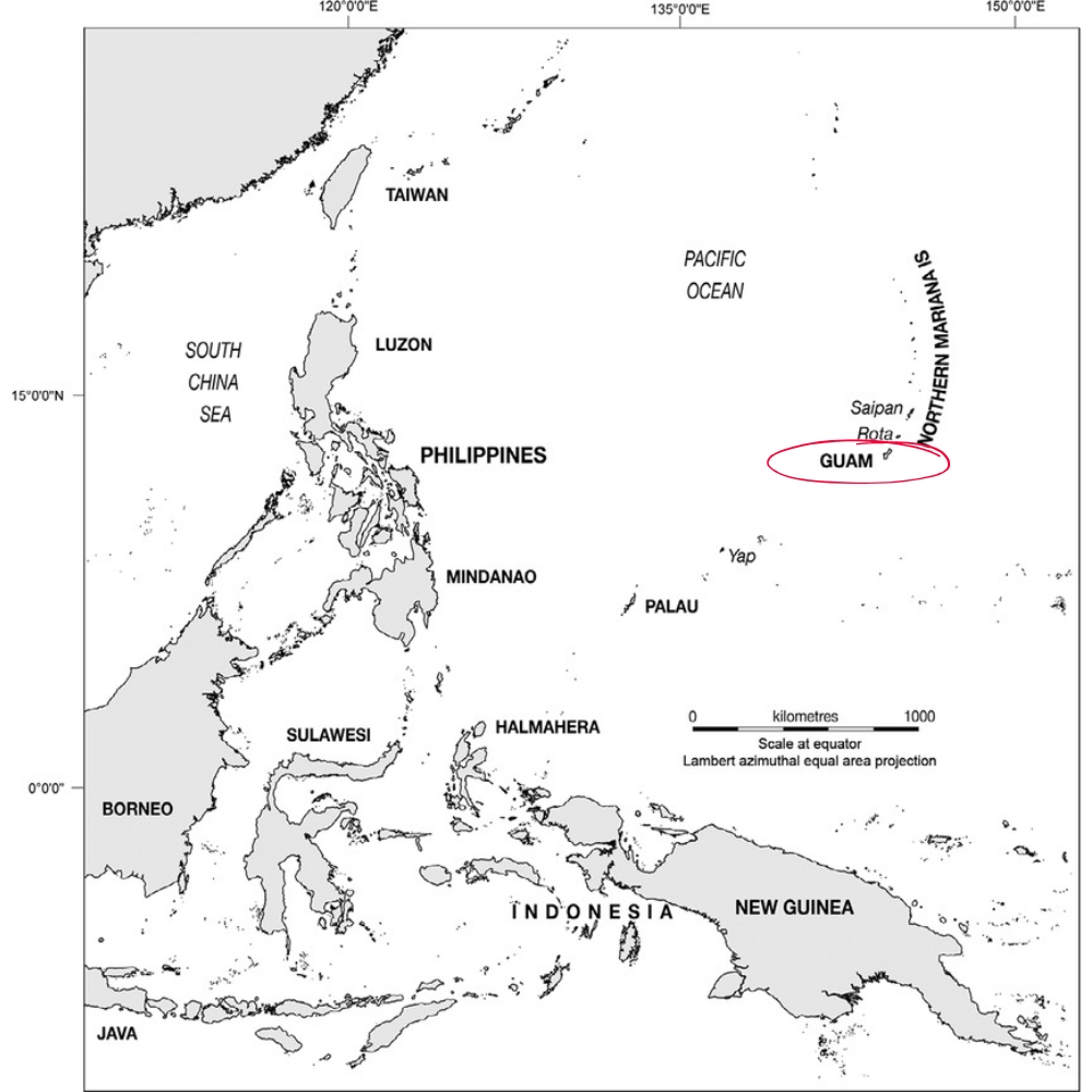 Regional map showing Guam’s position east of the Philippines in the western Pacific.