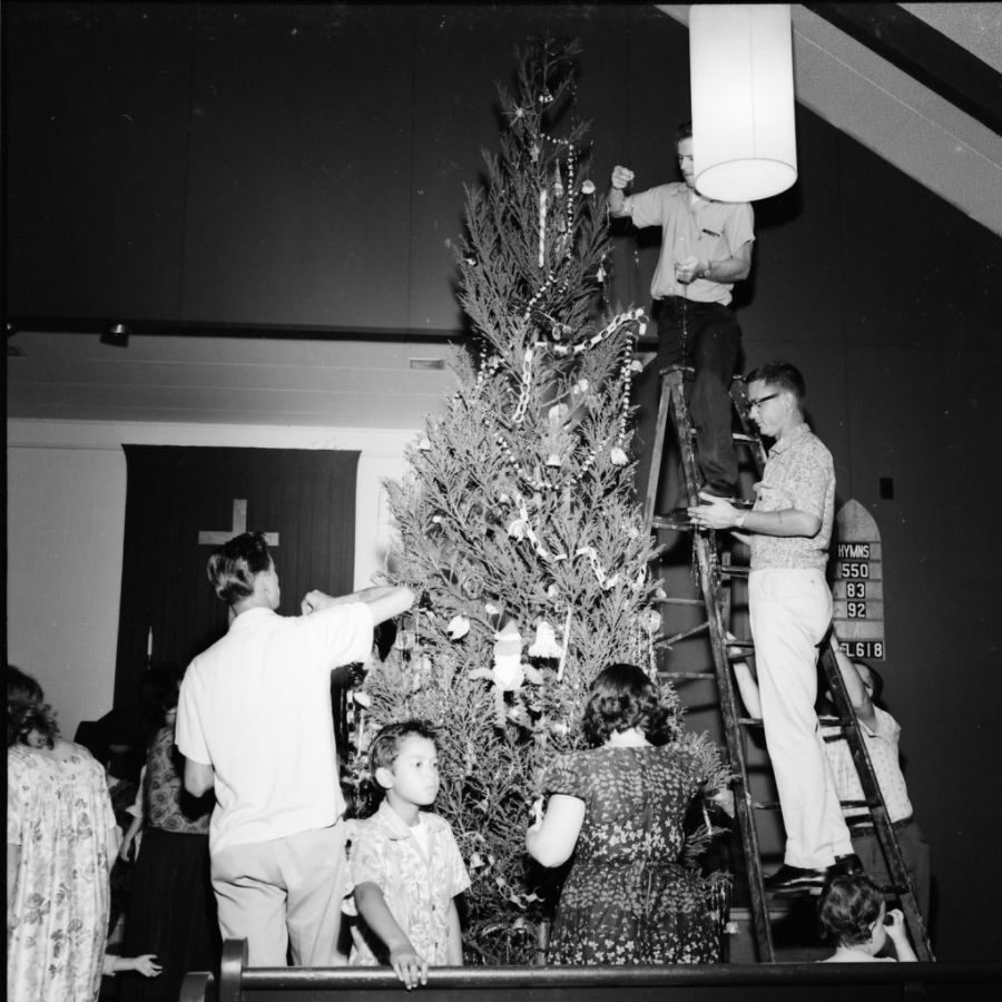 Decorating the Christmas tree, Hilo Methodist Church, December 16, 1962.